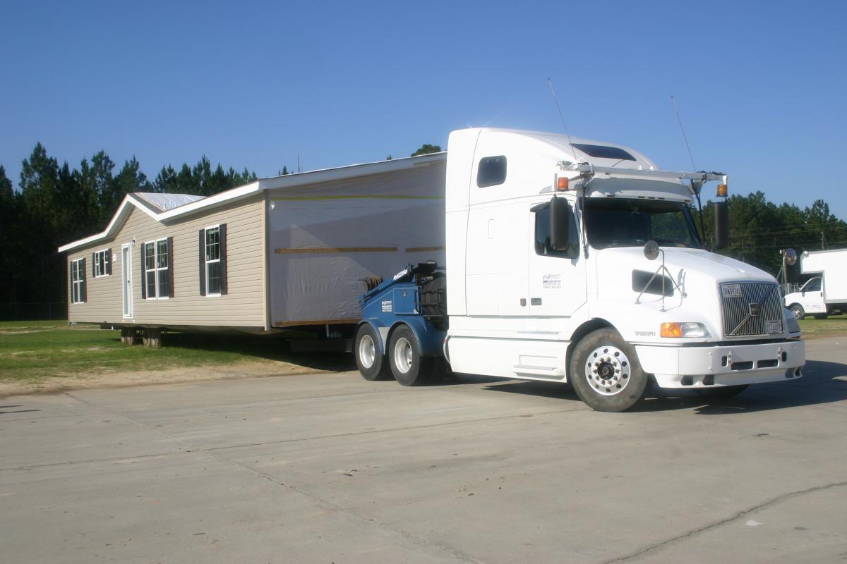 Truck hauling a mobile home